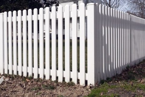 PVC fence in a corner of the yard, integrating seamlessly with landscaping